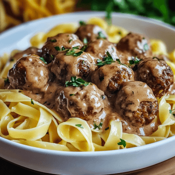 Easy Pleasy Meatballs over Buttered Noodles