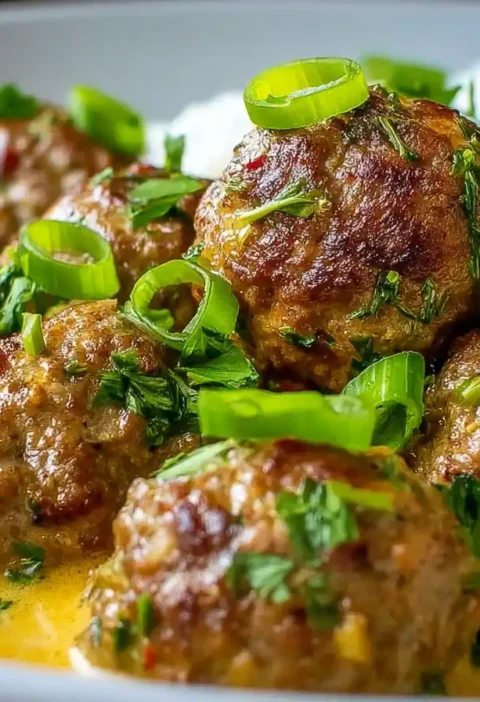 Jerk Meatballs In Coconut Curry Sauce